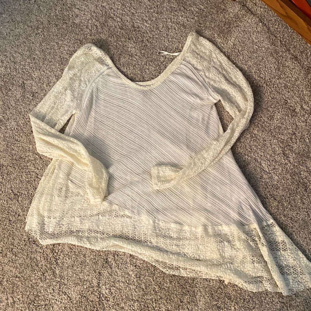 Free People Asymmetrical too. Beautiful cream and lace